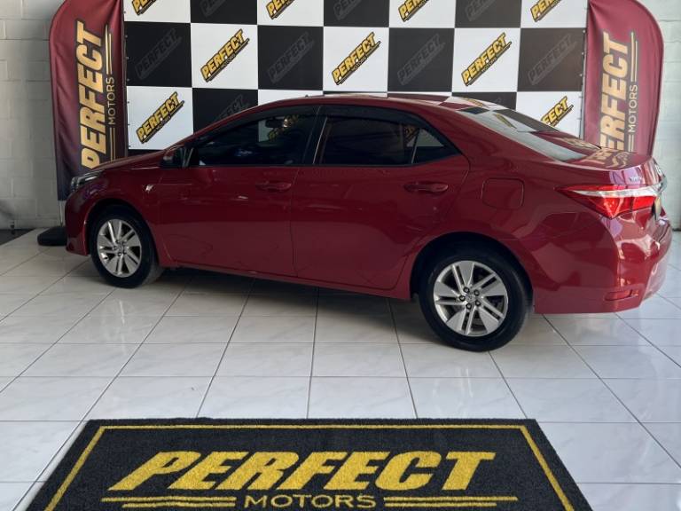 TOYOTA - COROLLA - 2016/2016 - Vermelha - R$ 79.900,00