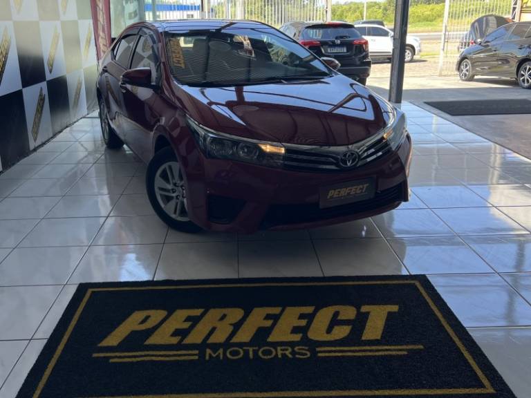 TOYOTA - COROLLA - 2016/2016 - Vermelha - R$ 79.900,00