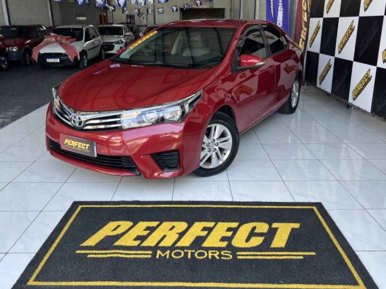 TOYOTA - COROLLA - 2016/2016 - Vermelha - R$ 79.900,00